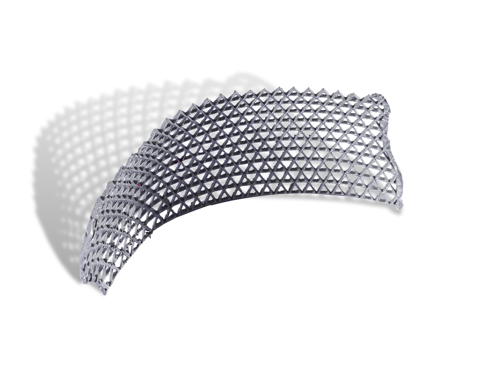 Metal 3D-printed lattice cranial implant featuring a porous, curved structure optimized for lightweight and osseointegration.