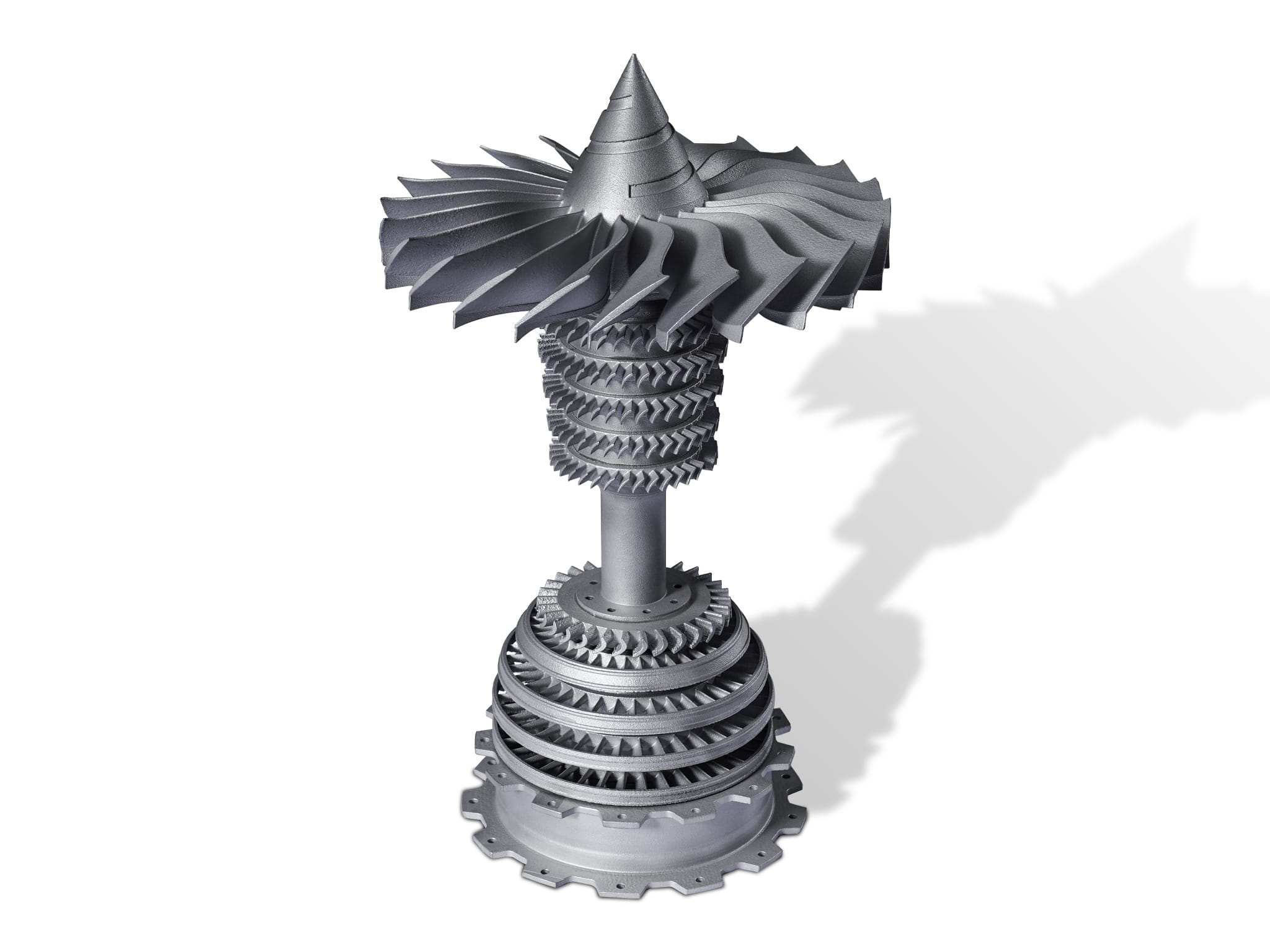 Metal 3D printing solutions aerospace turbine component with multiple intricate blade stages, displayed on a white background